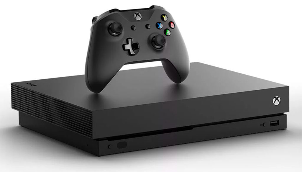 xbox one x console and controller