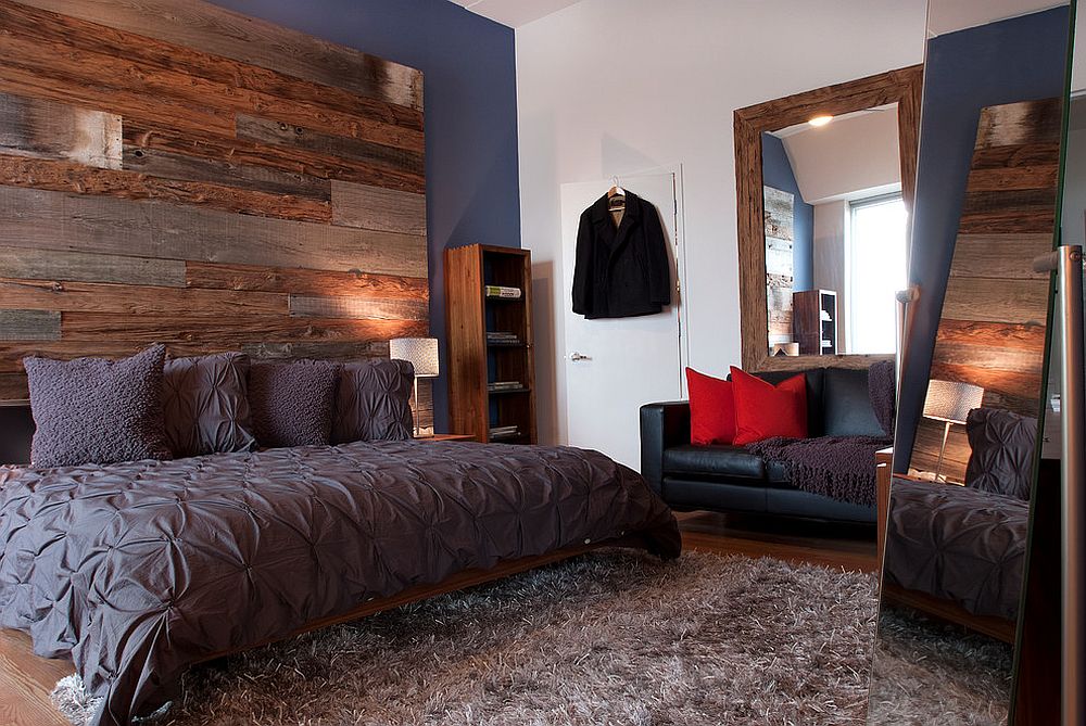 Exquisite bedroom design in a Philadelphia penthouse with accent wall crafted from wood