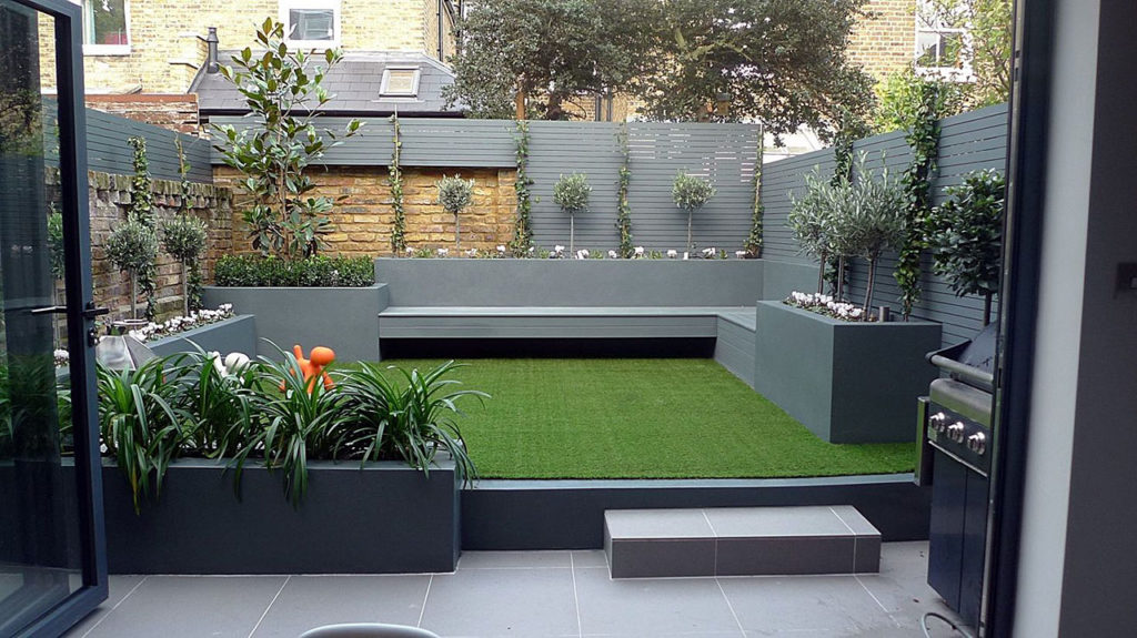 Modern Backyard-Small-low-maintenance raised planters fake grass grey bench