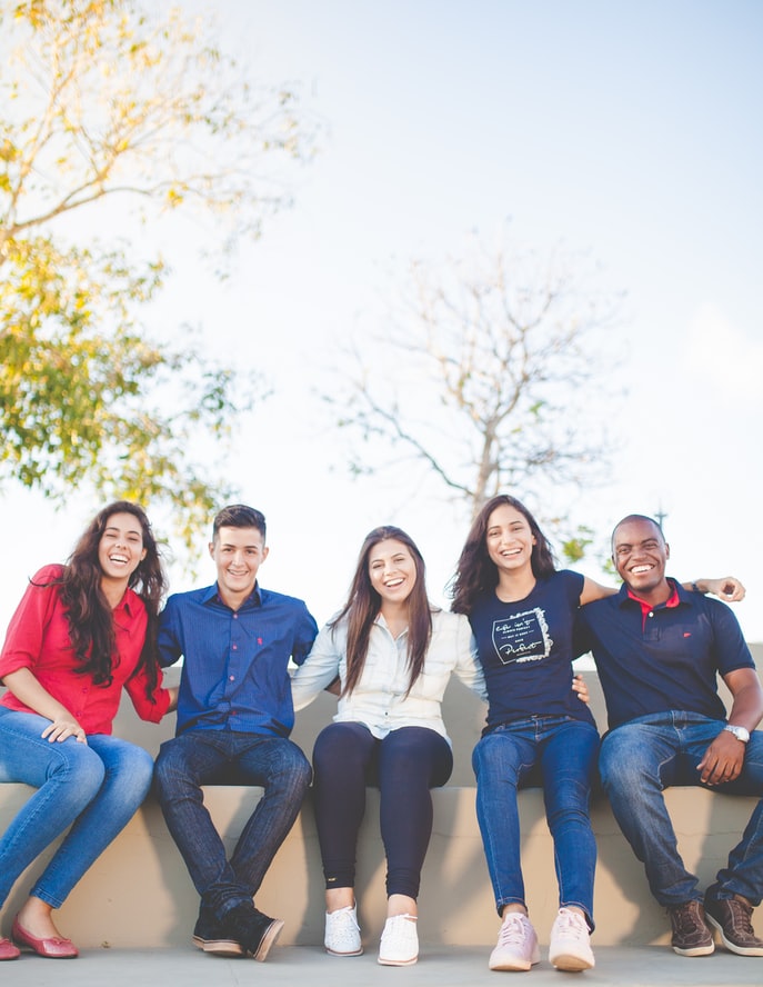 five-friends-sitting-together