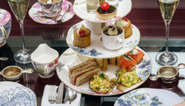 Champagne high tea with cakes and finger sandwiches