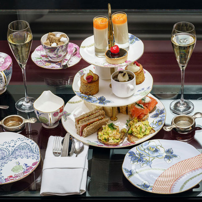 Champagne high tea with cakes and finger sandwiches