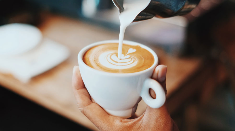 Espresso with crema being poured