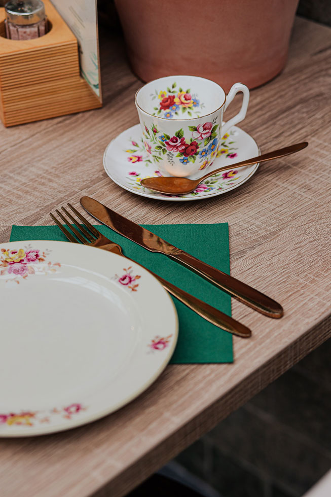 Floral Tea table setting with cut and saucer and plate