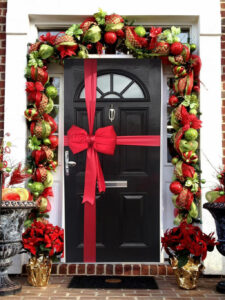 Christmas Front Door with Big Ribbon Cross and Bow